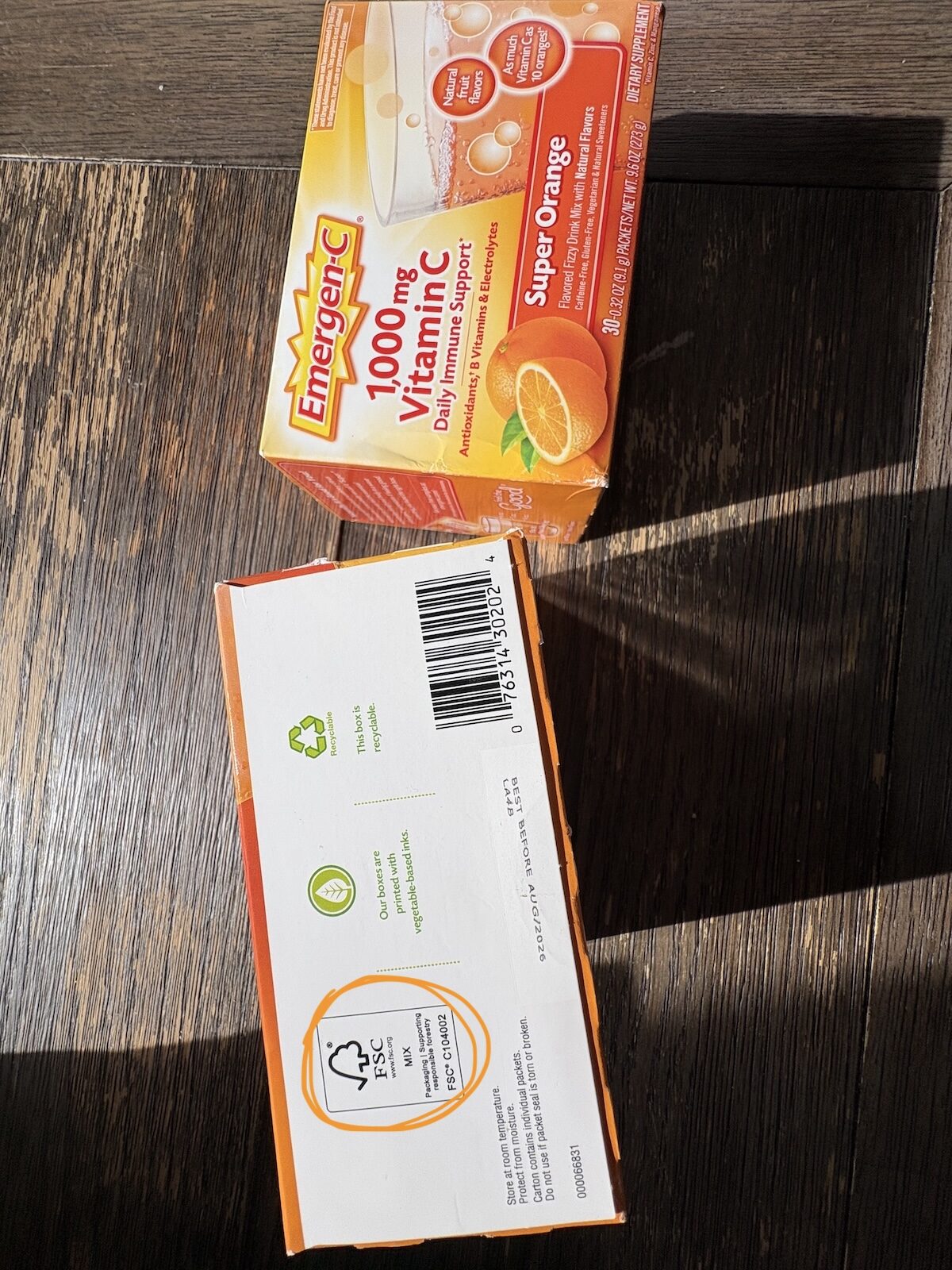 emergenc-4 Two boxes of Emergen-C sit on a wooden table