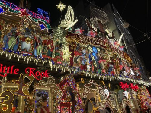 Oodles of neon lights at night advertising The Nutcracker and other holiday fun