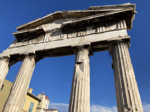 Majestic Greek ruins against a blue sky